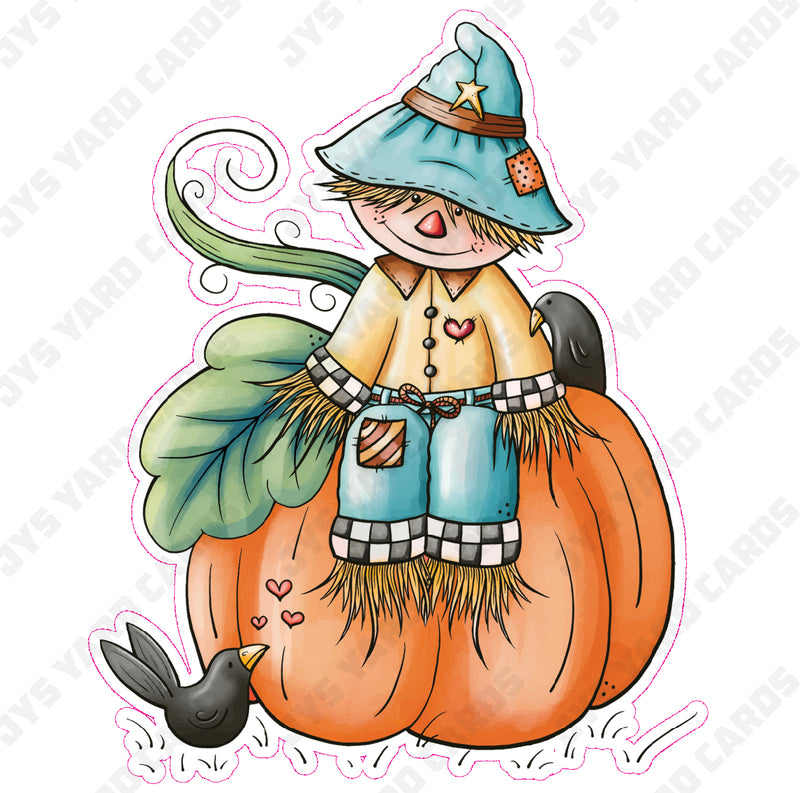 SCARECROW SITTING ON PUMPKIN 1